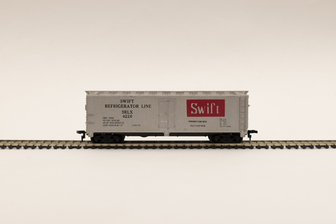 Vagon H0 carga cerrado refrigerado Swift SRLX 4226 Tyco 329a - Usado